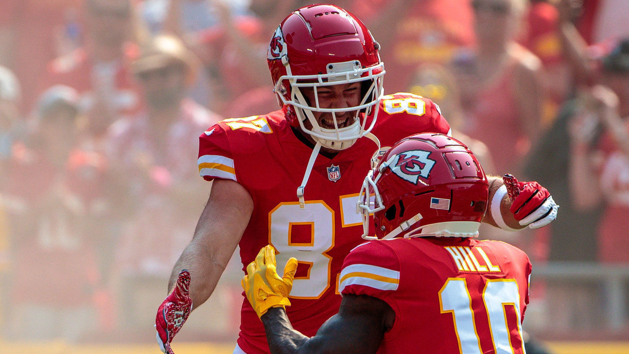KANSAS CITY, MO - SEPTEMBER 12: Kansas City Chiefs tight end Travis Kelce (87) and Kansas City Chiefs wide receiver Tyreek Hill (10) embrace on the field prior to the game against the Cleveland Browns on September 12th at GEHA field at Arrowhead Stadium in Kansas City, Missouri.