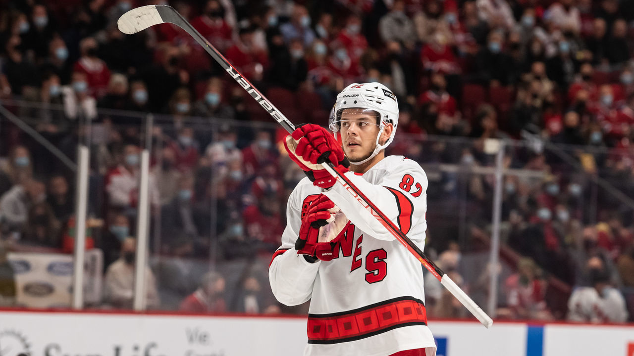 MONTREAL, QC - OCTOBER 21: Jesperi Kotkaniemi (82) of the Carolina Hurricanes looks on during the first period of the NHL game between the Carolina Hurricanes and the Montreal Canadiens on October 21, 2021, at the Bell Centre in Montreal, QC
