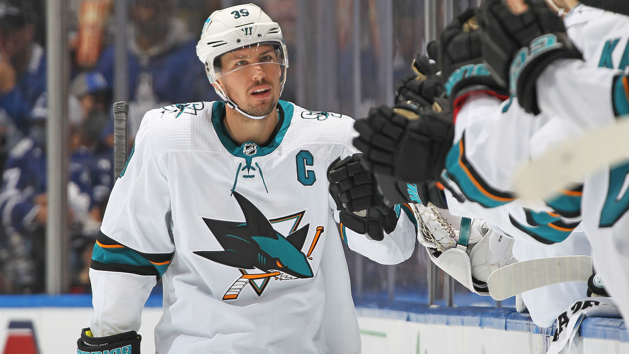 TORONTO, ON - OCTOBER 22: Logan Couture #39 of the San Jose Sharks celebrates a goal against the Toronto Maple Leafs during an NHL game at Scotiabank Arena on October 22, 2021 in Toronto, Ontario, Canada.