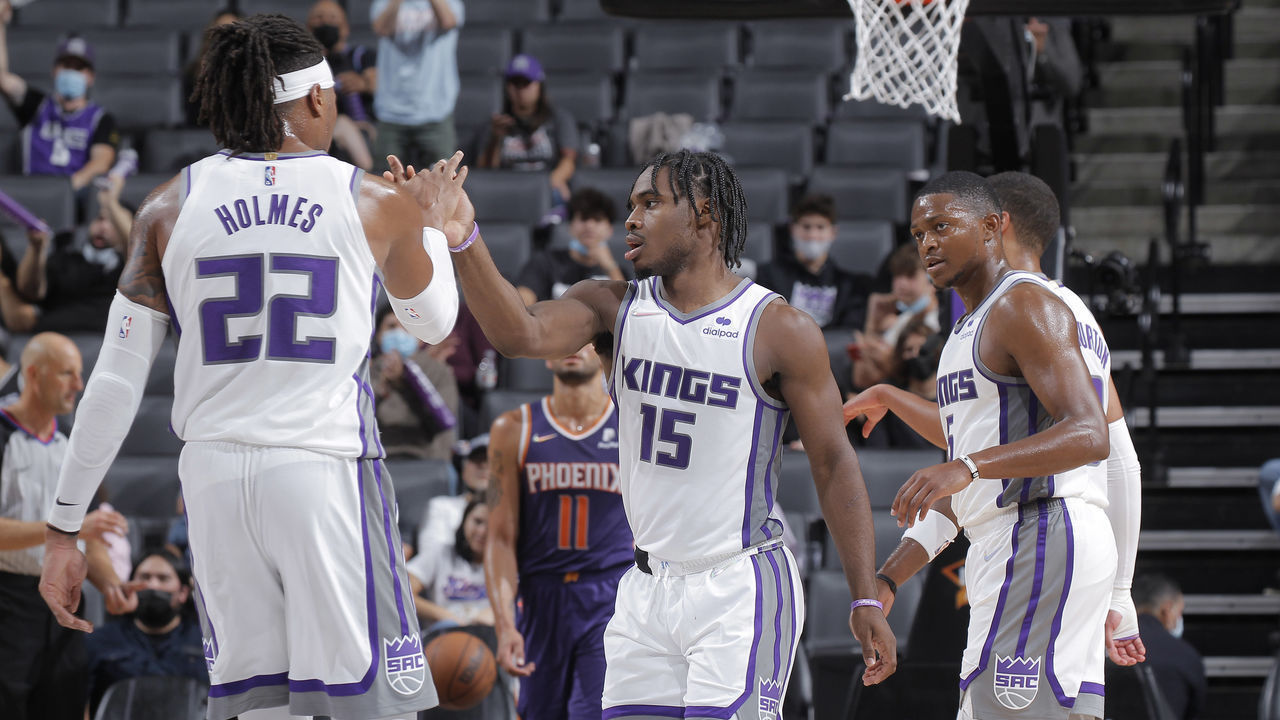 SACRAMENTO, CA - OCTOBER 4: Richaun Holmes #22 and Davion Mitchell #15 of the Sacramento Kings high five during the game against the Phoenix Suns on October 4, 2021 at Golden 1 Center in Sacramento, California. NOTE TO USER: User expressly acknowledges and agrees that, by downloading and or using this photograph, User is consenting to the terms and conditions of the Getty Images Agreement. Mandatory Copyright Notice: Copyright 2021 NBAE