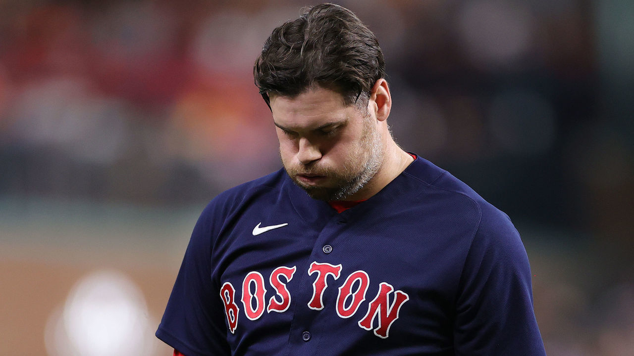 HOUSTON, TEXAS - OCTOBER 22: Adam Ottavino #0 of the Boston Red Sox reacts against the Houston Astros during the eighth inning in Game Six of the American League Championship Series at Minute Maid Park on October 22, 2021 in Houston, Texas.