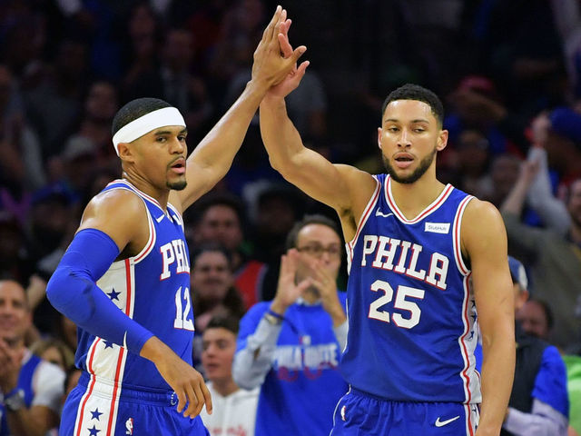 PHILADELPHIA, PA - OCTOBER 23: Tobias Harris #12 and Ben Simmons #25 of the Philadelphia 76ers celebrate during the game against the Boston Celtics at Wells Fargo Center on October 23, 2019 in Philadelphia, Pennsylvania.