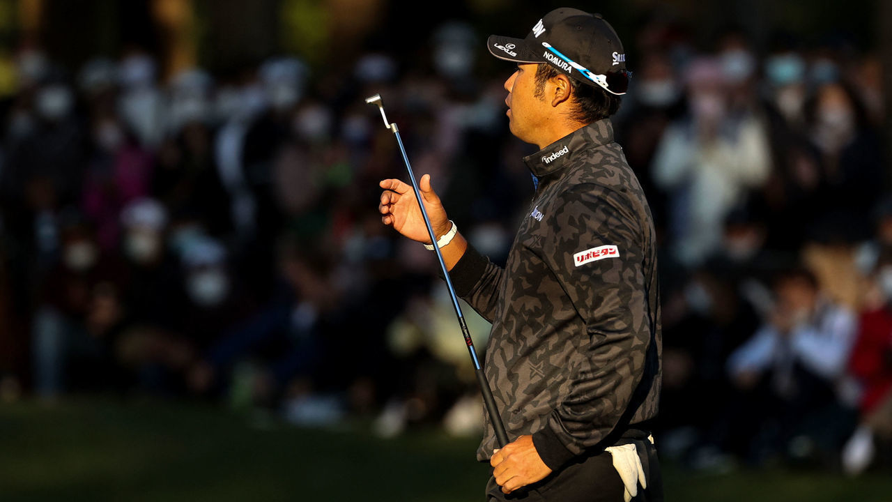 Hideki Matsuyama of Japan reacts after playing a putt at the 18th green during the third round of the PGA ZOZO Championship golf tournament at the Narashino Country Club in Inzai, Chiba prefecture on October 23, 2021.