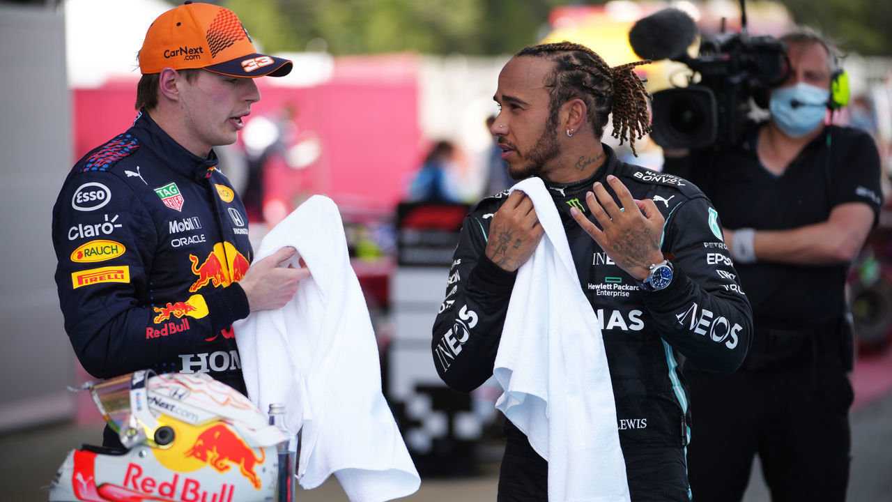 BARCELONA, SPAIN - MAY 09: Second placed Max Verstappen of Netherlands and Red Bull Racing speaks with race winner Lewis Hamilton of Great Britain and Mercedes GP in parc ferme after the F1 Grand Prix of Spain at Circuit de Barcelona-Catalunya on May 09, 2021 in Barcelona, Spain.