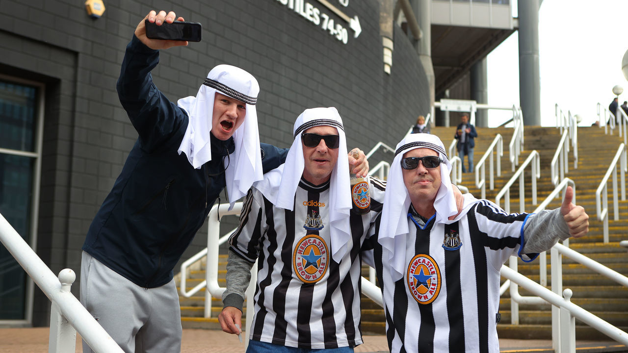 NEWCASTLE UPON TYNE, ENGLAND - OCTOBER 17: Fans of Newcastle United dressed in Fancy Dress are seen prior to the Premier League match between Newcastle United and Tottenham Hotspur at St. James Park on October 17, 2021 in Newcastle upon Tyne, England.