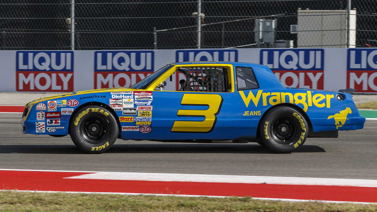 AUSTIN, TX - OCTOBER 23: McLaren F1 driver Daniel Ricciardo (3) (AUS) at turn 19 in Dale Earnhardt's 1984 Cup Car (3) at the F1 United States Grand Prix held October 23, 2021 at the Circuit of the Americas in Austin, TX.