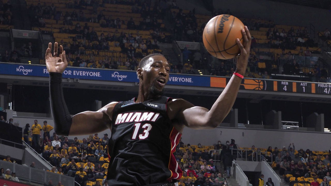 INDIANAPOLIS, IN - OCTOBER 23: Bam Adebayo #13 of the Miami Heat grabs a rebound against the Indiana Pacers on October 23, 2021 at Gainbridge Fieldhouse in Indianapolis, Indiana. Mandatory Copyright Notice: Copyright 2021 NBAE