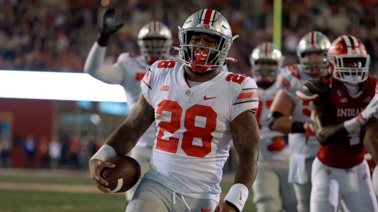 BLOOMINGTON, INDIANA - OCTOBER 23: Miyan Williams #28 of the Ohio State Buckeyes scores a touchdown during the first quarter in the game against the Indiana Hoosiers at Indiana University on October 23, 2021 in Bloomington, Indiana.