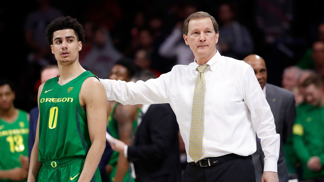 TUCSON, AZ - FEBRUARY 22: Oregon Ducks head coach Dana Altman stands with guard Will Richardson (0) during overtime of the college basketball game against the Arizona Wildcats at McKale Center on February 22, 2020 in Tucson, Arizona.