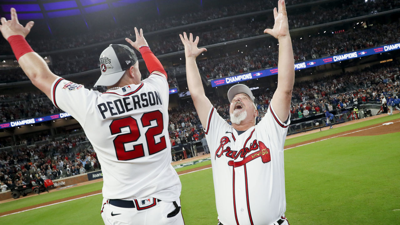 Atlanta, GA - October 23: Atlanta Braves' Joc Pederson, left, celebrates with pitching coach Rick Kranitz after defeating the Los Angeles Dodgers 4-2 in game six in the 2021 National League Championship Series at Truist Park on Saturday, Oct. 23, 2021 in Atlanta, GA. (Robert Gauthier / Los Angeles Times via Getty Images)