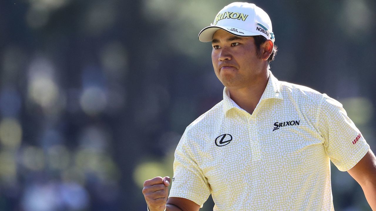 Japan's Hideki Matsuyama reacts after making a putt on the 11th green during the final round of the PGA ZOZO Championship golf tournament at the Narashino Country Club in Inzai, Chiba prefecture on October 24, 2021.