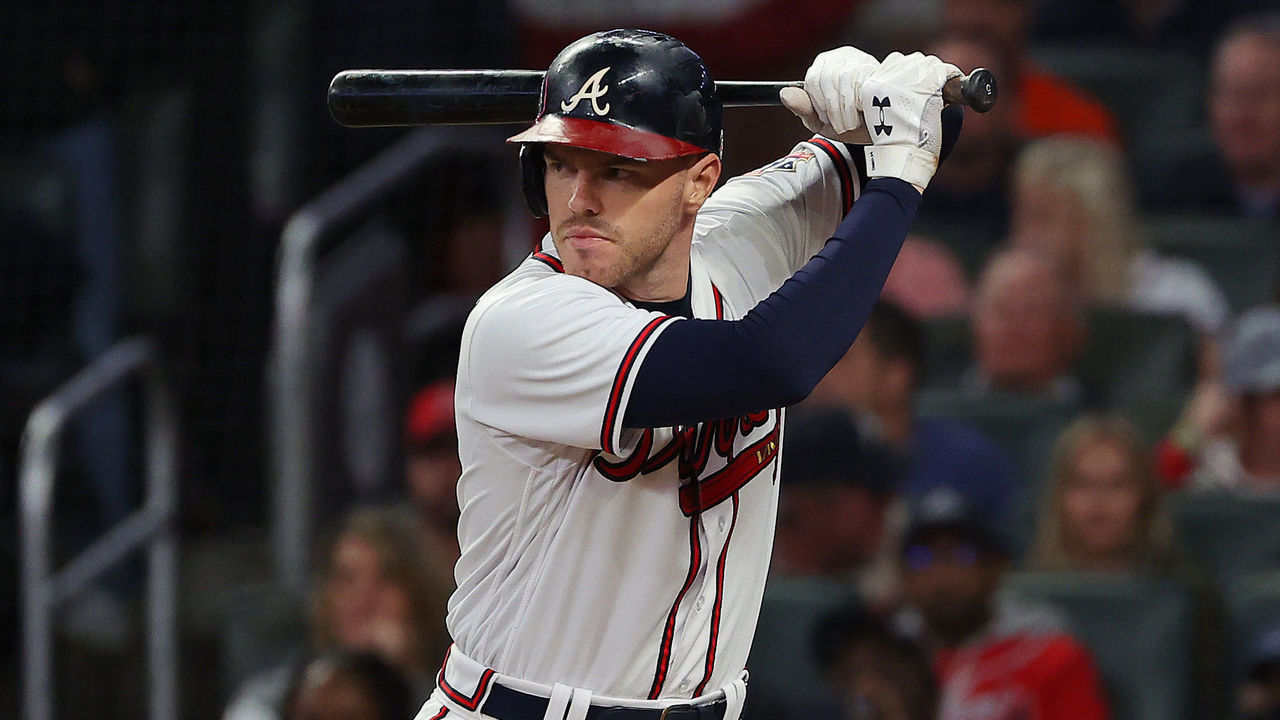 ATLANTA, GEORGIA - OCTOBER 16: Freddie Freeman #5 of the Atlanta Braves at bat against the Los Angeles Dodgers during the first inning of Game One of the National League Championship Series at Truist Park on October 16, 2021 in Atlanta, Georgia.