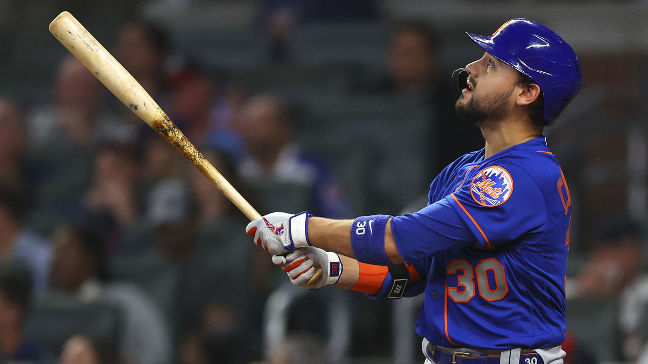 ATLANTA, GA - OCTOBER 02: Michael Conforto #30 of the New York Mets watches after hitting a ball deep for a home run during the eighth inning of the game against the Atlanta Braves at Truist Park on October 2, 2021 in Atlanta, Georgia.