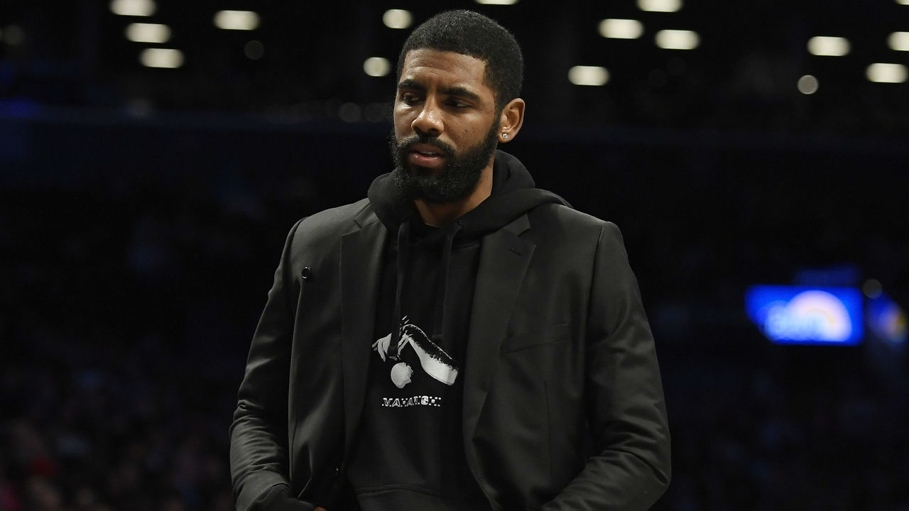 NEW YORK, NEW YORK - JANUARY 10: Kyrie Irving #11 of the Brooklyn Nets looks on from the bench during the second half of the game against the Miami Heat at Barclays Center on January 10, 2020 in the Brooklyn borough of New York City. Kyrie Irving #11 of the Brooklyn Nets was out with an injury.