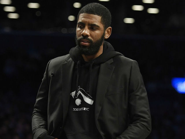 NEW YORK, NEW YORK - JANUARY 10: Kyrie Irving #11 of the Brooklyn Nets looks on from the bench during the second half of the game against the Miami Heat at Barclays Center on January 10, 2020 in the Brooklyn borough of New York City. Kyrie Irving #11 of the Brooklyn Nets was out with an injury.
