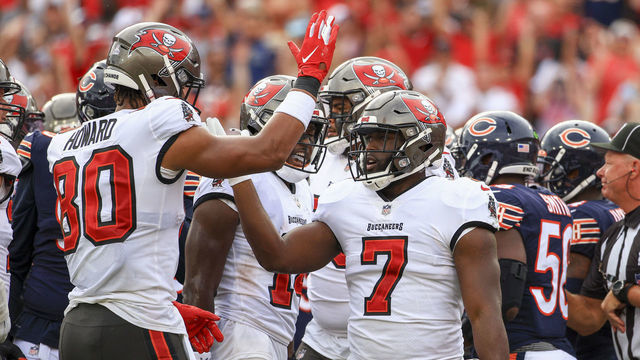 TAMPA, FLORIDA - OCTOBER 24: Leonard Fournette #7 of the Tampa Bay Buccaneers celebrates with teammates after scoring a touchdown in the first quarter against the Chicago Bears in the game at Raymond James Stadium on October 24, 2021 in Tampa, Florida.