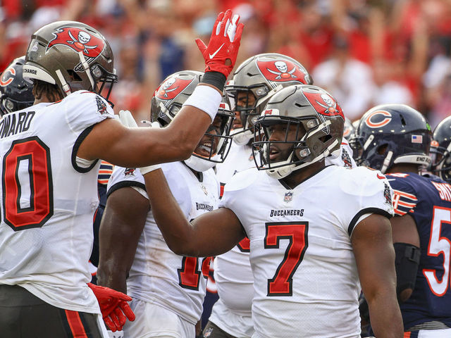TAMPA, FLORIDA - OCTOBER 24: Leonard Fournette #7 of the Tampa Bay Buccaneers celebrates with teammates after scoring a touchdown in the first quarter against the Chicago Bears in the game at Raymond James Stadium on October 24, 2021 in Tampa, Florida.