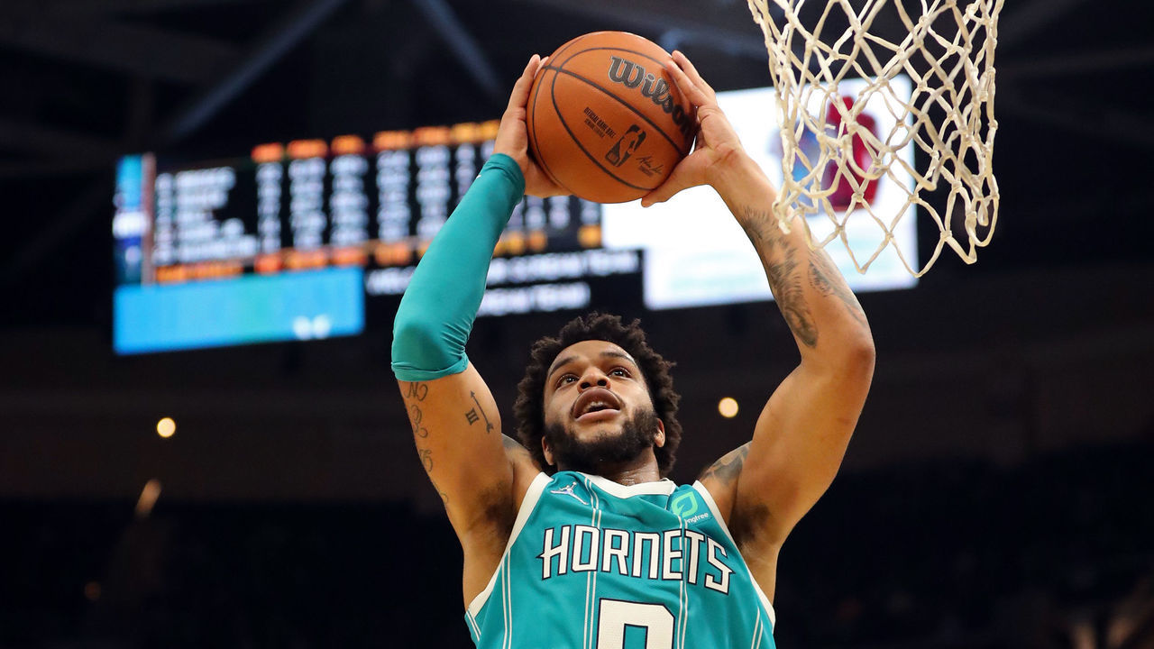 CLEVELAND, OH - OCTOBER 22: Miles Bridges #0 of the Charlotte Hornets grabs a rebound against the Cleveland Cavaliers on October 22, 2021 at Rocket Mortgage FieldHouse in Cleveland, Ohio. NOTE TO USER: User expressly acknowledges and agrees that, by downloading and/or using this Photograph, user is consenting to the terms and conditions of the Getty Images License Agreement. Mandatory Copyright Notice: Copyright 2021 NBAE