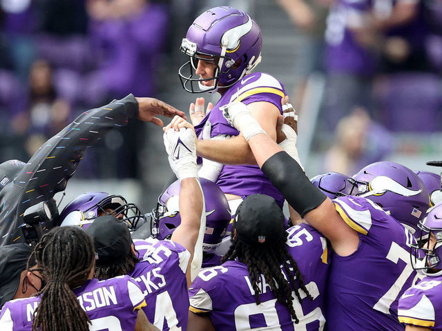 MINNEAPOLIS, MINNESOTA - OCTOBER 10: Greg Joseph #1 of the Minnesota Vikings is carried off the field after kicking a 54 yard field goal to win the game in the final seconds against the Detroit Lions at U.S. Bank Stadium on October 10, 2021 in Minneapolis, Minnesota. The Minnesota Vikings defeated the Detroit Lions 19-17.