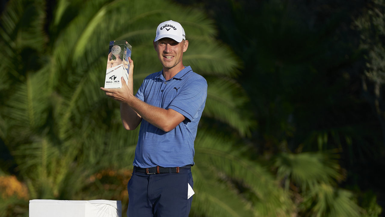 MALLORCA, SPAIN - OCTOBER 24: Jeff Winther of Denmark celebrates with the winners trophy after the final round during Day Four of Mallorca Golf Open at Golf Santa Ponsa on October 24, 2021 in Mallorca, Spain.