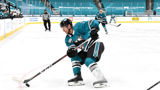 SAN JOSE, CA - MAY 08: Dylan Gambrell #7 of the San Jose Sharks skates with the puck against the Arizona Coyotes at SAP Center on May 8, 2021 in San Jose, California.