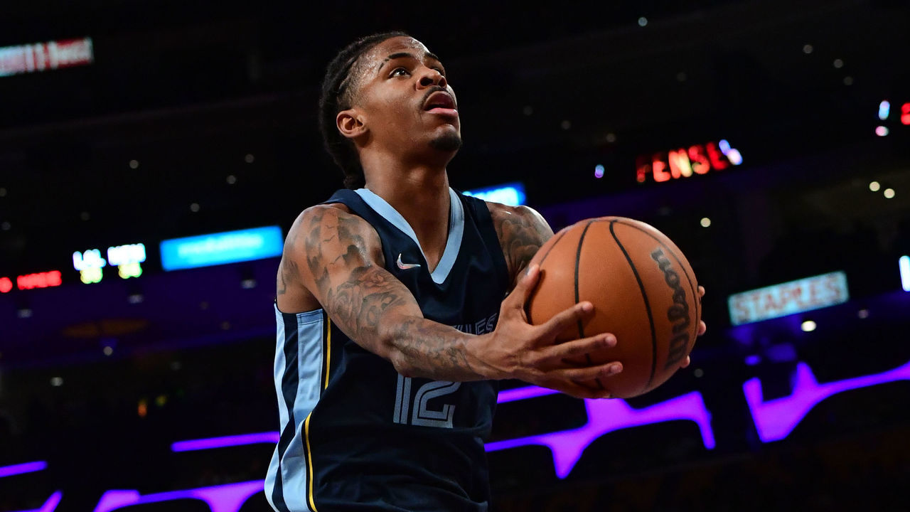 LOS ANGELES, CA - OCTOBER 24: Ja Morant #12 of the Memphis Grizzlies drives to the basket during the game against the Los Angeles Lakers on October 24, 2021 at STAPLES Center in Los Angeles, California. NOTE TO USER: User expressly acknowledges and agrees that, by downloading and/or using this Photograph, user is consenting to the terms and conditions of the Getty Images License Agreement. Mandatory Copyright Notice: Copyright 2021 NBAE