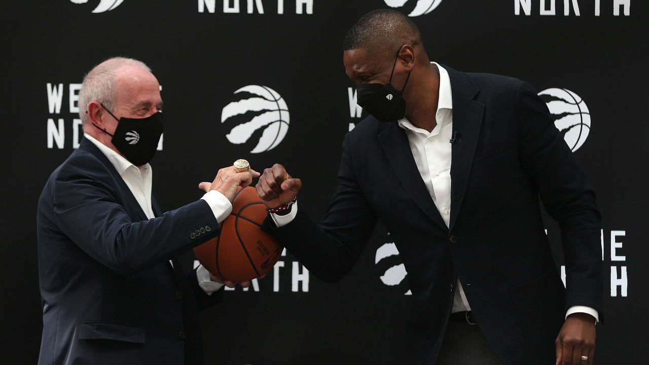 Toronto, ON- August 18 - Larry Tanenbaum greets Toronto Raptors President Masai Ujiri during a press conference to address his new title, vice-chairman, his new contract, his relationship with Kyle Lowry, and more at the X Hotel on the Canadian National Exhibition in Toronto. August 18, 2021. (Steve Russell/Toronto Star via Getty Images)