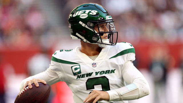 New York Jets quarterback Zach Wilson looks for a pass during the match which is part of the NFL London Games at Tottenham Hotspur Stadium, London. Picture date: Sunday October 10, 2021.