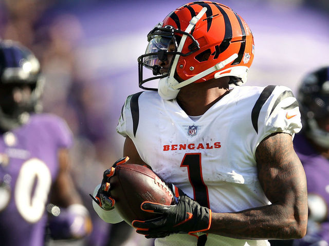 BALTIMORE, MARYLAND - OCTOBER 24: Ja'Marr Chase #1 of the Cincinnati Bengals catches the ball for a touchdown during the second half in the game against the Baltimore Ravens at M&T Bank Stadium on October 24, 2021 in Baltimore, Maryland.