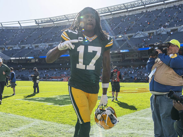 CHICAGO, IL - OCTOBER 17: Green Bay Packers wide receiver Davante Adams (17) celebrates with teammates and fans after defeating the Chicago Bears by the sore of 24-14 on October 17, 2021, at Soldier field in Chicago, IL.