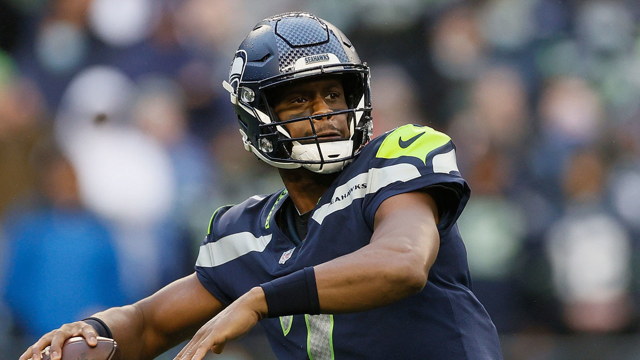 SEATTLE, WASHINGTON - OCTOBER 25: Geno Smith #7 of the Seattle Seahawks drops back to pass during the first half against the New Orleans Saints at Lumen Field on October 25, 2021 in Seattle, Washington.