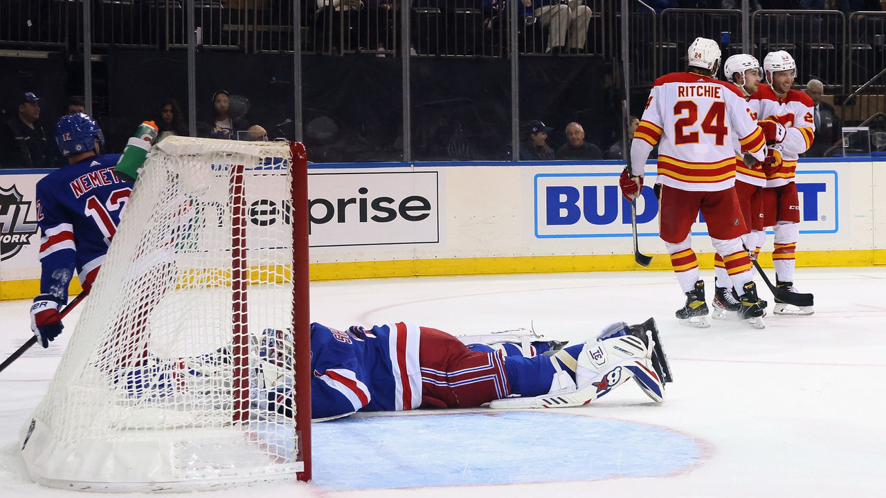 NEW YORK, NEW YORK - OCTOBER 25: Igor Shesterkin #31 of the New York Rangers lies in the net following a powerplay goal by Andrew Mangiapane #88 of the Calgary Flames at 19:55 of the third period at Madison Square Garden on October 25, 2021 in New York City. The Flames defeated the Rangers 5-1.