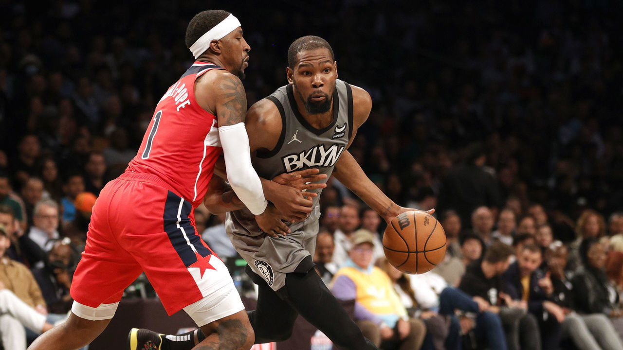 NEW YORK, NEW YORK - OCTOBER 25: Kevin Durant #7 of the Brooklyn Nets dribbles against Kentavious Caldwell-Pope #1 of the Washington Wizards during the second half at Barclays Center on October 25, 2021 in the Brooklyn borough of New York City. The Nets won 104-90.