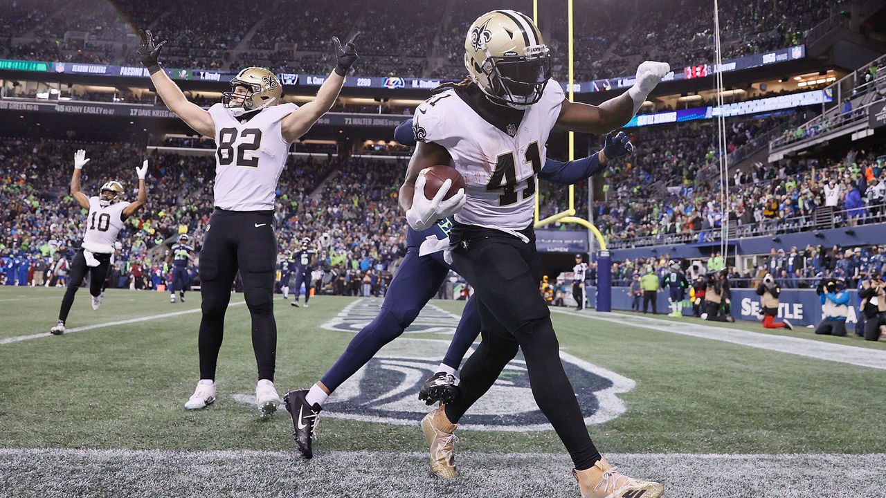 SEATTLE, WASHINGTON - OCTOBER 25: Alvin Kamara #41 of the New Orleans Saints catches a pass for a touchdown during the first half against the Seattle Seahawks at Lumen Field on October 25, 2021 in Seattle, Washington.