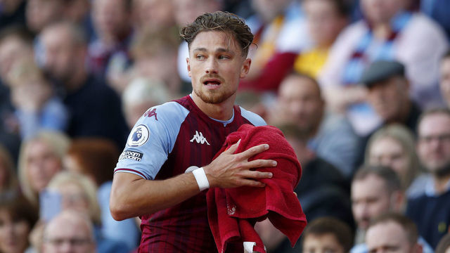 BIRMINGHAM, ENGLAND - OCTOBER 16: Matty Cash of Aston Villa dries the ball prior to taking a throw-in during the Premier League match between Aston Villa and Wolverhampton Wanderers at Villa Park on October 16, 2021 in Birmingham, England.