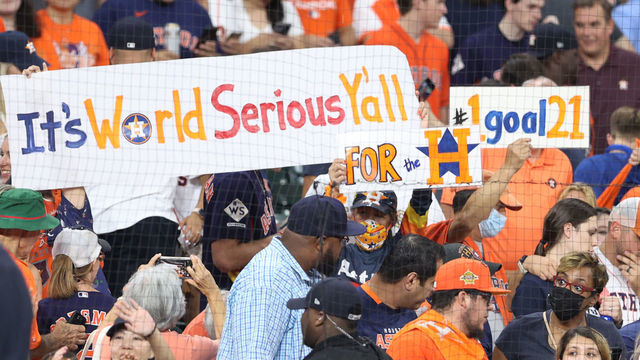 HOUSTON, TEXAS - OCTOBER 22: Houston Astros fans celebrate after defeating the Boston Red Sox 5-0 in Game Six of the American League Championship Series to advance to the World Series at Minute Maid Park on October 22, 2021 in Houston, Texas.