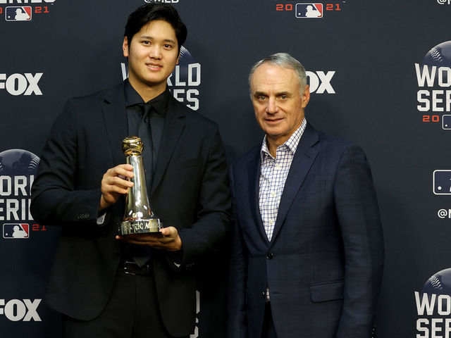 A photo of Corey Seager with the Willie Mays World Series MVP & the  Commisioner's Trophy. #MLB