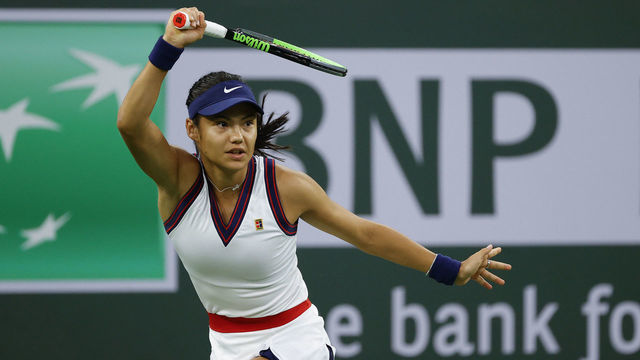 INDIAN WELLS, CALIFORNIA - OCTOBER 08: Emma Raducanu of Great Britain returns a shot to Aliaksandra Sasnovich of Belarus during the BNP Paribas Open at the Indian Wells Tennis Garden on October 08, 2021 in Indian Wells, California.