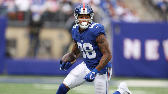 EAST RUTHERFORD, NEW JERSEY - OCTOBER 24: Evan Engram #88 of the New York Giants in action against the Carolina Panthers during their game at MetLife Stadium on October 24, 2021 in East Rutherford, New Jersey.