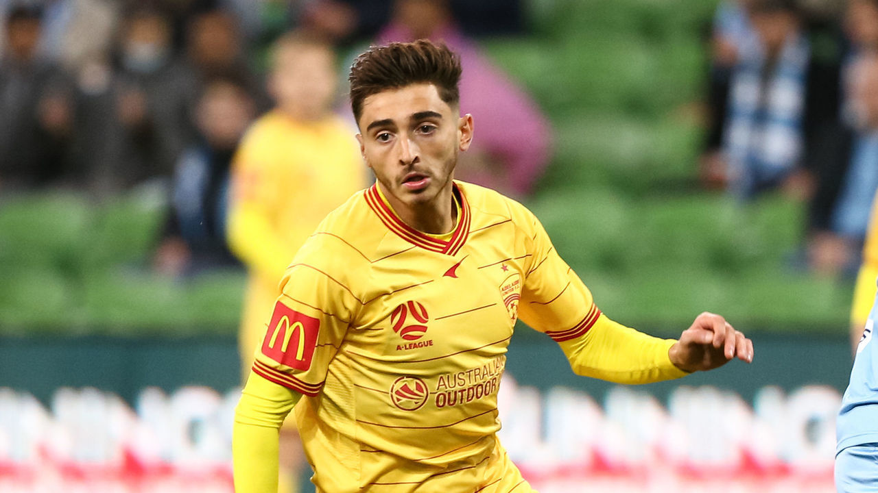 MELBOURNE, AUSTRALIA - MAY 13: Joshua Cavallo of Adelaide United controls the ball during the Hyundai A-League soccer match between Melbourne City FC and Adelaide United on May 13, 2021 at AAMI Park in Melbourne, Australia.