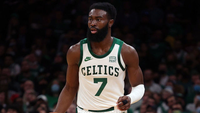 BOSTON, MASSACHUSETTS - OCTOBER 22: Jaylen Brown #7 of the Boston Celtics dribbles down court during the Celtics home opener against the Toronto Raptors at TD Garden on October 22, 2021 in Boston, Massachusetts.