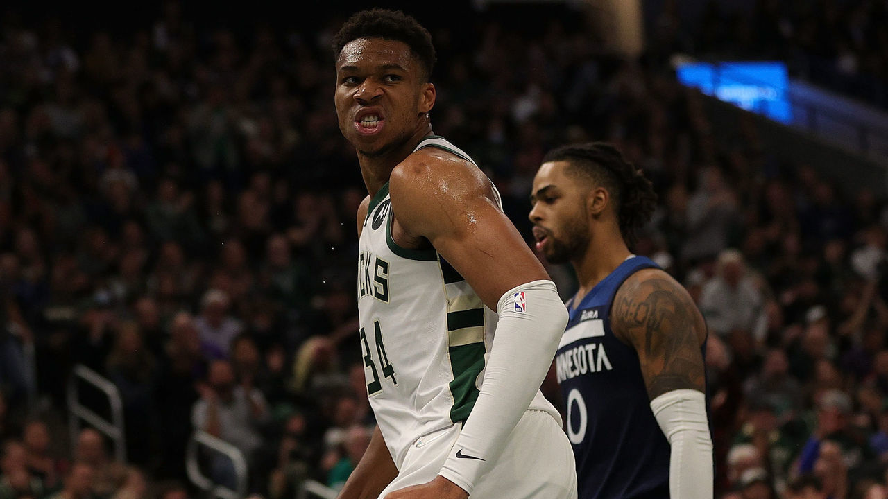 MILWAUKEE, WISCONSIN - OCTOBER 27: Giannis Antetokounmpo #34 of the Milwaukee Bucks reacts to a dunk during the first half of a game against the Minnesota Timberwolves at Fiserv Forum on October 27, 2021 in Milwaukee, Wisconsin.