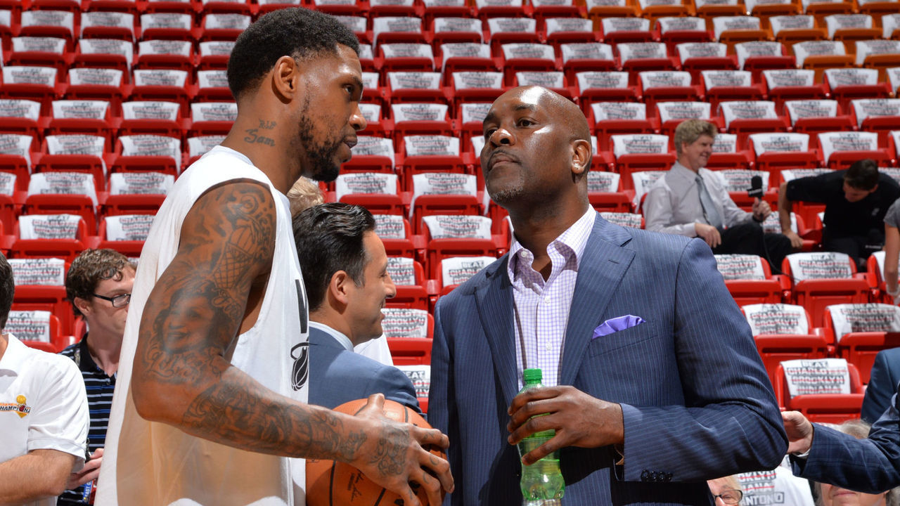 MIAMI, FL - JUNE 10: Udonis Haslem #40 of the Miami Heat talks with Gary Payton before Game Three of the 2014 NBA Finals against the San Antonio Spurs on June 10, 2014 at American Airlines Arena in Miami, Florida. Mandatory Copyright Notice: Copyright 2014 NBAE