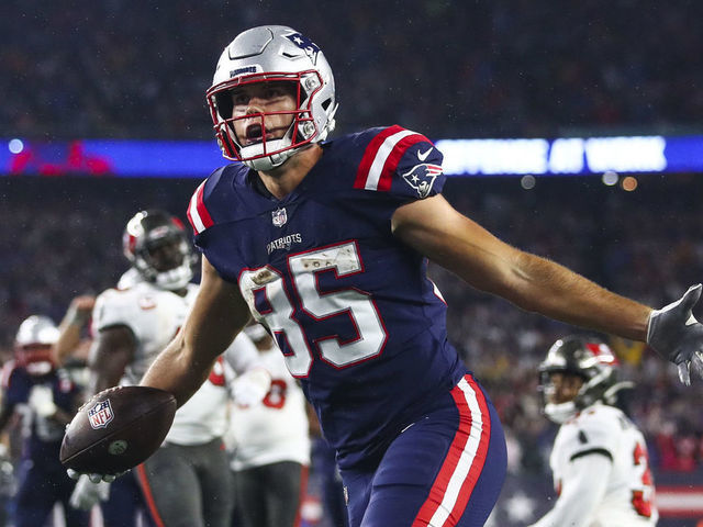 FOXBOROUGH, MASSACHUSETTS - OCTOBER 03: Hunter Henry #85 of the New England Patriots celebrates after scoring a touchdown against the Tampa Bay Buccaneers during the second quarter in the game at Gillette Stadium on October 03, 2021 in Foxborough, Massachusetts.
