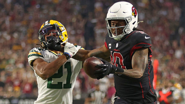 GLENDALE, ARIZONA - OCTOBER 28: DeAndre Hopkins #10 of the Arizona Cardinals is called for a personal foul penalty against Eric Stokes #21 of the Green Bay Packers during the first half at State Farm Stadium on October 28, 2021 in Glendale, Arizona.