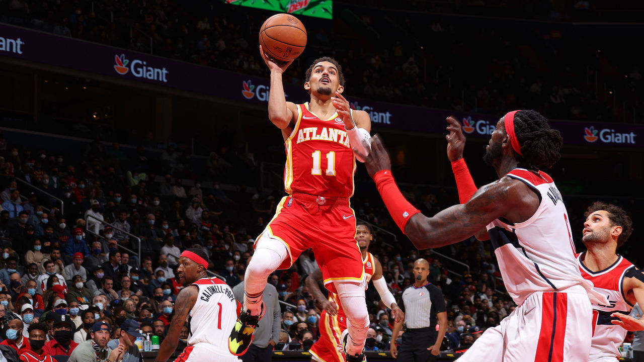WASHINGTON, DC - OCTOBER 28: Trae Young #11 of the Atlanta Hawks shoots the ball against the Washington Wizards on October 28, 2021 at Capital One Arena in Washington, DC. Mandatory Copyright Notice: Copyright 2021 NBAE