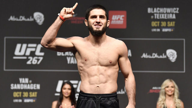 ABU DHABI, UNITED ARAB EMIRATES - OCTOBER 29: Islam Makhachev of Russia poses on the scale during the UFC 267 ceremonial weigh-in at Etihad Arena on October 29, 2021 in Yas Island, Abu Dhabi, United Arab Emirates.