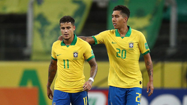 SAO PAULO, BRAZIL - OCTOBER 09: Philippe Coutinho of Brazil celebrates with Roberto Firmino after scoring the fifth goal during a match between Brazil and Bolivia as part of South American Qualifiers for Qatar 2022 at Neo Quimica Arena on October 09, 2020 in Sao Paulo, Brazil.