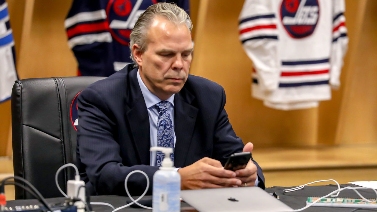 WINNIPEG, MB - OCTOBER 6: Winnipeg Jets General Manager Kevin Cheveldayoff prepares prior to the first round of the 2020 NHL Draft at Bell MTS Place on October 6, 2020 in Winnipeg, Manitoba, Canada. The 2020 NHL Draft was held virtually due to the ongoing Coronavirus pandemic.