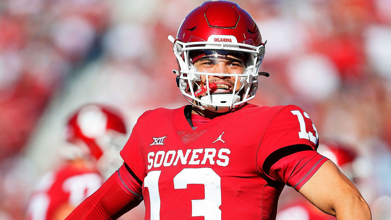 NORMAN, OK - OCTOBER 30: Quarterback Caleb Williams #13 of the Oklahoma Sooners celebrates a touchdown throw to the end zone against the Texas Tech Red Raiders in the second quarter at Gaylord Family Oklahoma Memorial Stadium on October 30, 2021 in Norman, Oklahoma.
